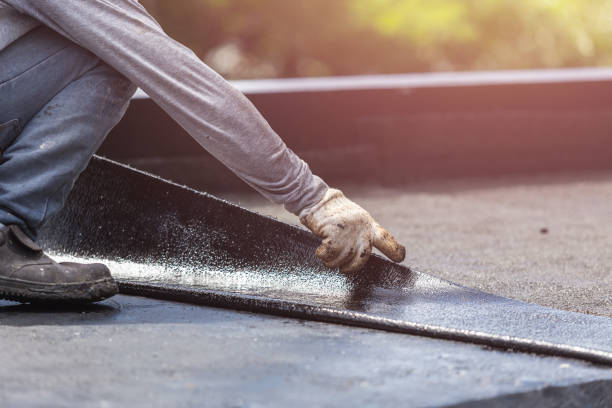Professional Waterproofing technician working in Bushton, KS